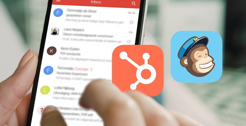 A person scrolling through a phone with the Hubspot and Mailchimp logos appearing.