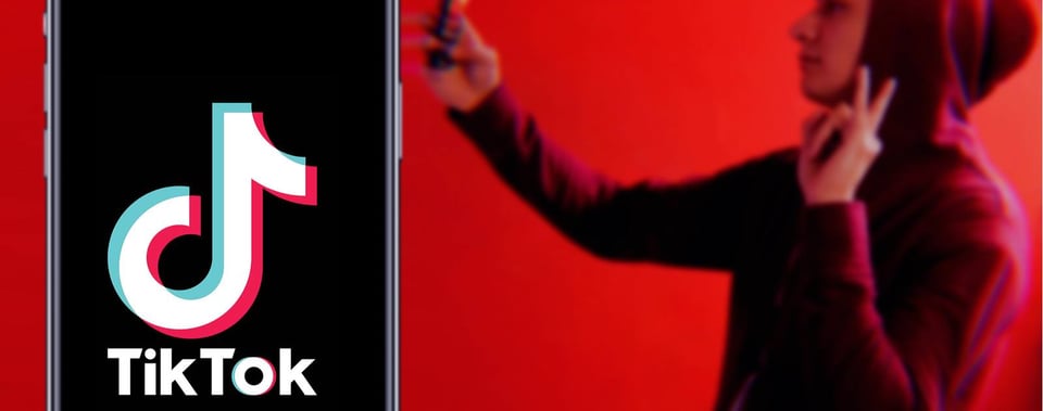 tiktok-logo-with-teens-using